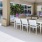 Outdoor kitchen and dining area at Varela Westshore apartments